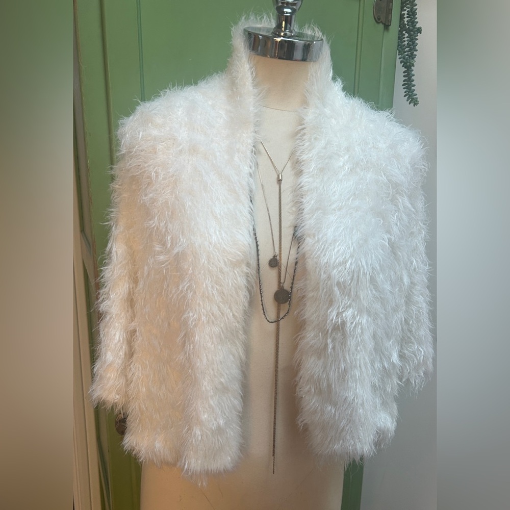 Anthropologie eyelash shrug.